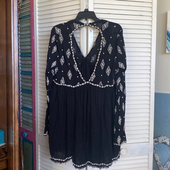 We the Free tunic black embroidered raw hem slight bell sleevess - Picture 6 of 6